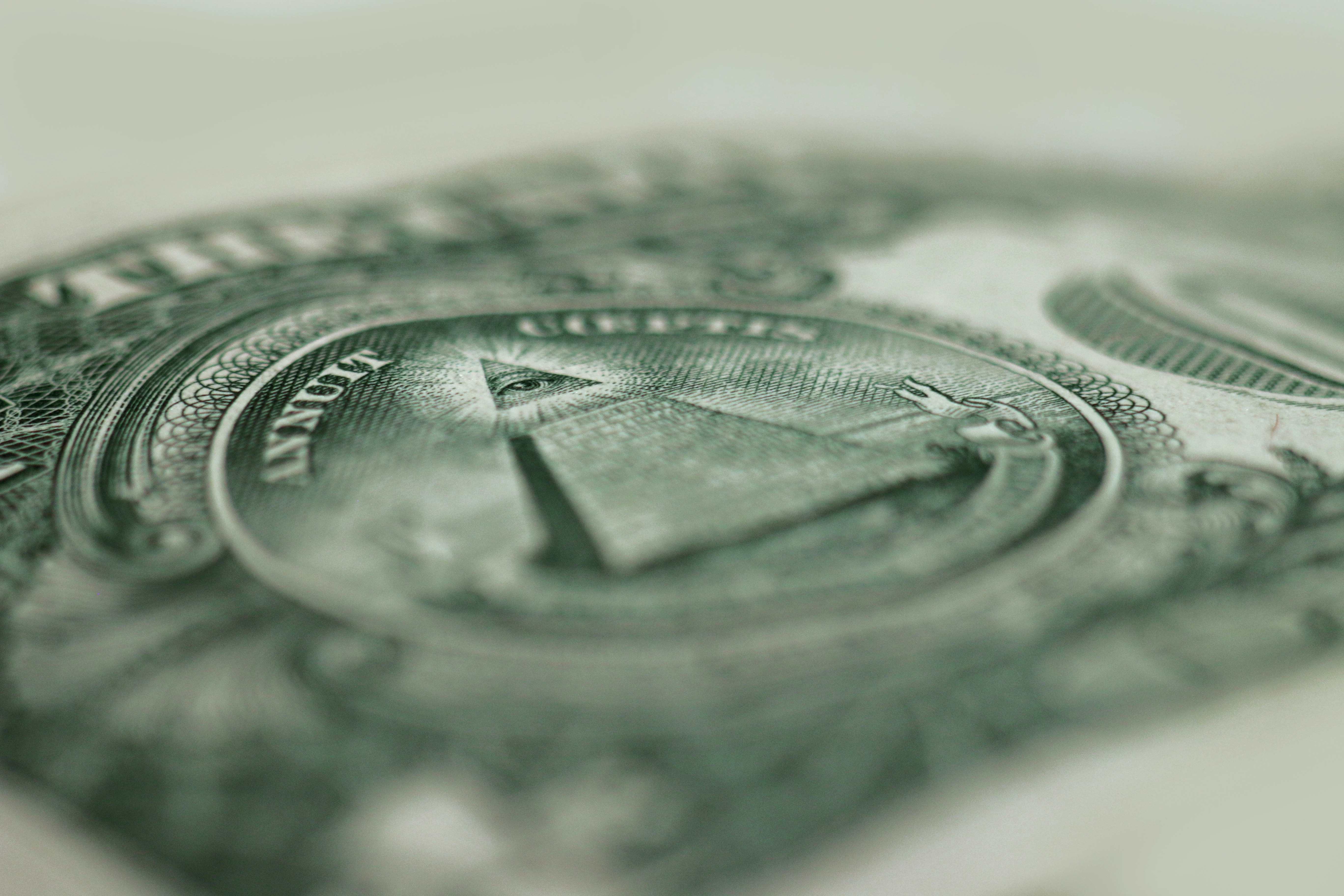 Close-up of the Eye of Providence on a US dollar bill